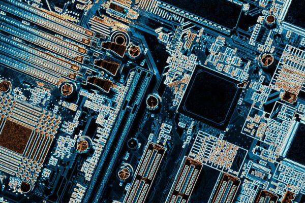 Computer circuit board with micro-chips, transistors and resistors.