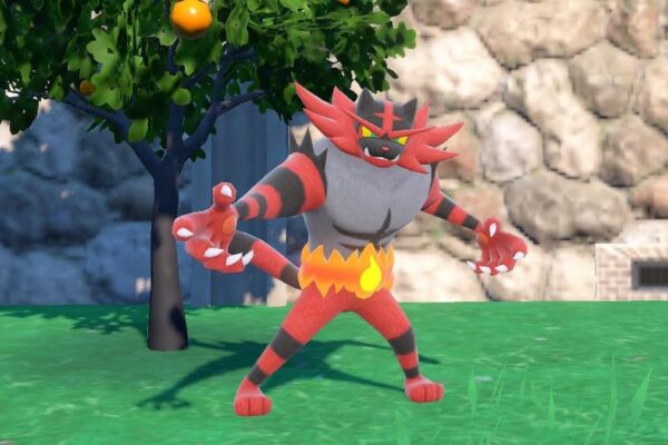 Incineroar standinng by a tree in Pokémon Scarlet and Violet.