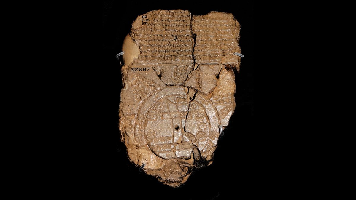 A clay tablet with engravings of a map and text.