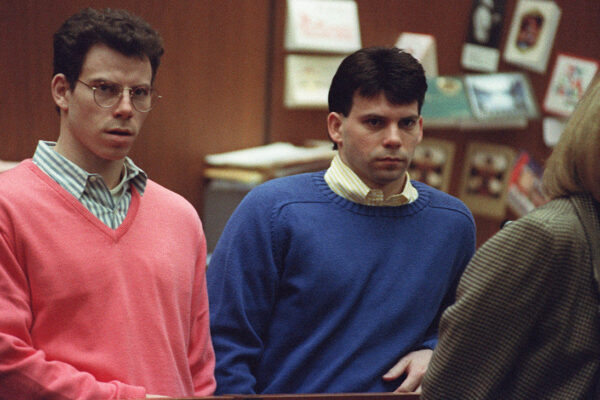 Erik Menendez (L) and his brother Lyle (R) listen during a pre-trial hearing, on December 29, 1992 in Los Angeles after the two pleaded innocent in the August 1989 shotgun deaths of their wealthy parents, Jose and Mary Louise Menendez of Beverly Hills, Calif.