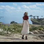 Una captura de pantalla de Final Fantasy VII: Rebirth en el puente de vapor. Aerith mira hacia otro lado de la cámara. Un gran campo cubierto de hierba y un océano son visibles en el fondo.