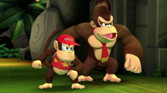Donkey Kong y un mono más pequeño en una gorra de béisbol en una jungla.