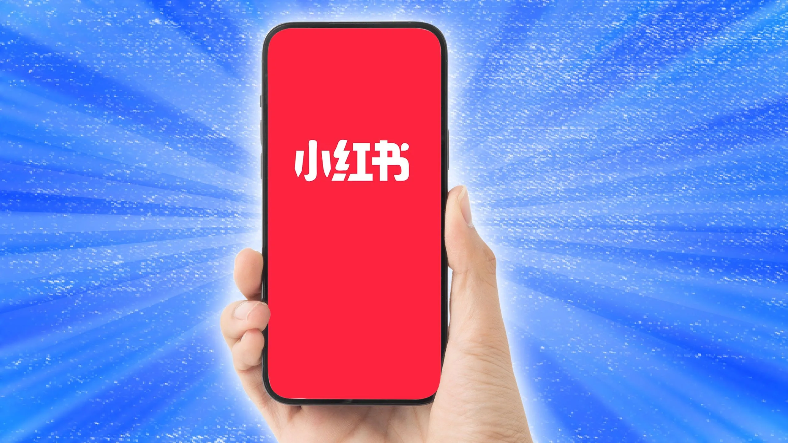 El logotipo de la aplicación rednote aparece en un teléfono en un fondo azul intermitente